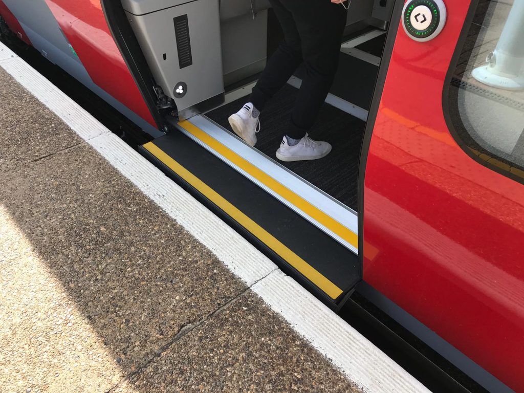 Train door at platform showing level boarding